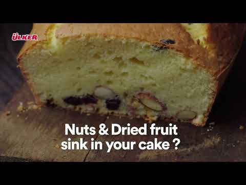 How do you keep fruit from sinking in bread?