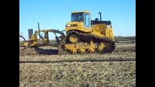 Tile Plow setup on a Cat D9