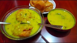 bonda soup recipe | urad dal fritters in a moong dal soup