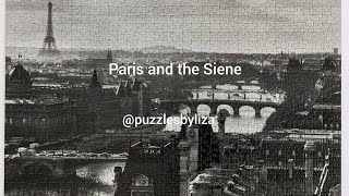 Ravensburger.  Paris and the Siene.  Peter Turnley/Corbis.  2013. 1000 pieces. No. 193554.