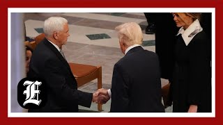 Trump and Pence shake hands at Carter's funeral service