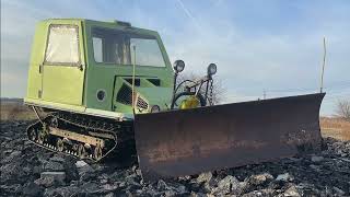 Cushman Trackster 'mini ripsaw' to plow the driveway