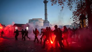 Tear gas and water cannons used across France as 130,000 protest new police security bill