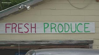 Local man selling fresh produce