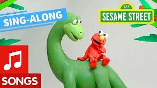 Sesame Street: Elmo's Dinosaur Song Lyric Video | Elmo's Sing Along Series