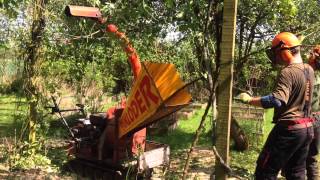 Narrow access woodchipper on tracked wheel barrow