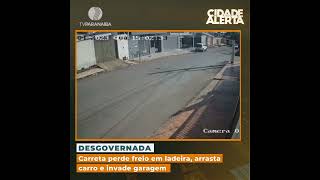 Carreta perde freio em ladeira, arrasta carro e invade garagem | Cidade Alerta Minas