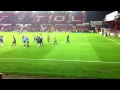 swindon town players celebrate beating bristol city