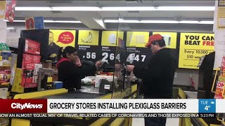 Business report: Grocery stores install plexiglass shields