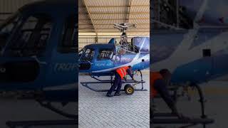 Installing rotor blades on a Eurocopter AS350 Helicopter