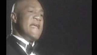 George Foreman sings Impossible Dream