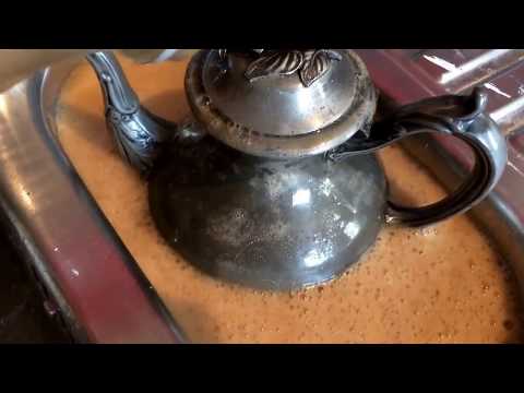 Cleaning vintage pewter tea pot with vinegar, olive oil and Coke-a-Cola POV Cleaning vintage pewter tea pot with vinegar, olive oil and Coke-a-Cola POV