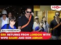 Shah Rukh Khan PROTECTS son AbRam as they RETURN from mini vacation with wife Gauri Khan