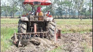 Kubota M6040SU tractor plows the field clean, fast and fast /Save time and effort with a tractor