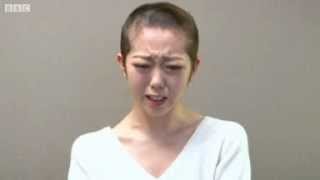 AKB48 pop star shaves head after breaking band rules