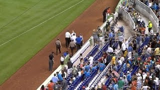 OAK@MIA: Fan injured after Punto's foul ball