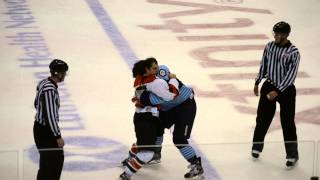 Komets' Schrock fights Evansville's Hannay