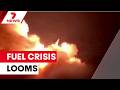 Iran-US strikes escalate as global fuel crisis looms | 7NEWS