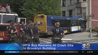 MTA Bus Remains At Crash Site In Brooklyn Building