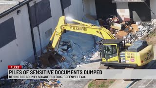 Hundreds of confidential documents, records, personal info allegedly dumped behind Greenville Co. Sq