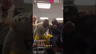 Steelers head coach Mike Tomlin dancing with his players after win