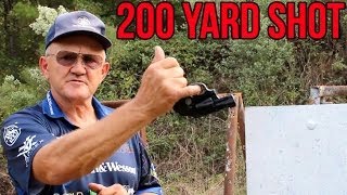 IMPOSSIBLE 200 yard snub nose revolver shot- upside down, one handed, with pinky finger