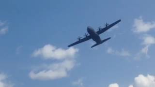 Canadian military plane C-130 Hercules flies really low over Halliburton Lake, Ontario, Canada