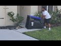 Man with trash can's showdown with gator in Florida goes viral