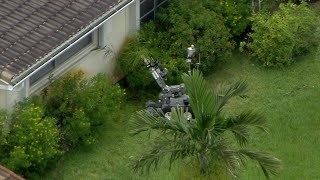 1 detained after search warrant served at marijuana grow house, authorities say