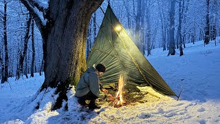 Surviving in sub-zero temperatures without a tent: Solo winter camping in a snowstorm