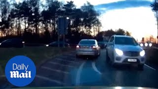 Police is forced to chase a car on the wrong side of the road