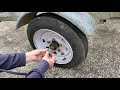 How to replace bearing dust cap with rubber plug grommet cover on small utility trailer axle