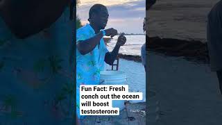 Ricky Rolez eats a piece of fresh conch out the Atlantic Ocean waters. #explore #fresh #new #food