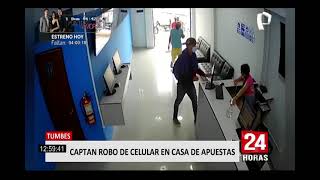 Tumbes: cámaras registran robo de celular en casa de apuestas