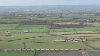 EWS Loco passes the Cement Factory at Westbury with loaded Stone Train 20.02.12