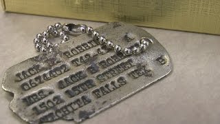 Medina boy returns military dog tags to family of WW II pilot during emotional school ceremony