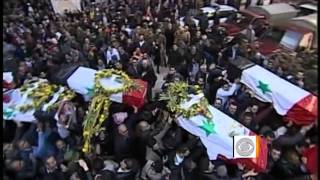 Mass funeral for victims in Syria