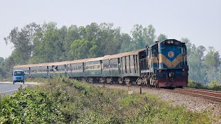 Rajshahi Express Train on Road side Rail Curve at Bangabandhu Setu Road, Tangail- Bangladesh Railway