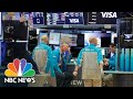 Stocks Slide Lower As Investors Wrap Up A Week Of Wild Swings | NBC News NOW