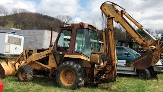 1981 Case 580 E Series Four Wheel-drive Backhoe with Front Loader