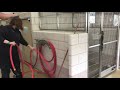 spot cleaning a kennel at ccas