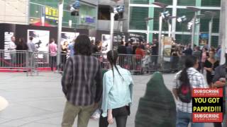 Chris D'Elia and Cassi Colvin outside the Mechanic Resurrection Premiere at ArcLight Theatre in Holl