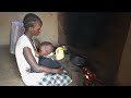 African village mother taking care of her sick child// African village life