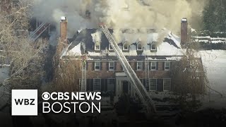 Fire burns through roof of Brookline mansion