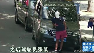 【1818黄金眼】小伙挑衅交警摄像头，用“人肉”遮挡号牌