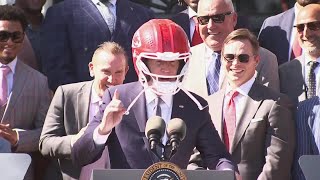 Biden dons Chiefs helmet as Super Bowl champ Chiefs visit White House