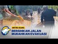 Warga Bersihkan Material Longsor untuk Mudahkan Tim SAR Evakuasi