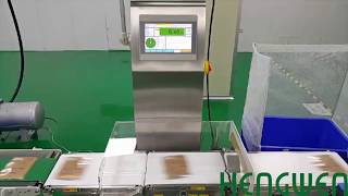 高速重量檢測機;重檢機高速生技面膜生產線;checkweigher; High-speed high-precision facial mask weight detector performance