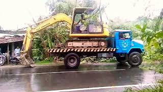 Simple trick to unload excavator from a truck