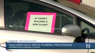 Teachers hold 'Die-In' mock funeral procession in their fight against returning to the classroom